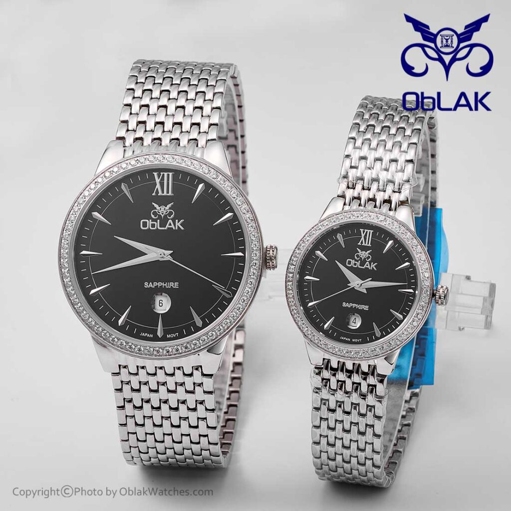 ست ساعت مچی عقربه ای زنانه و مردانه جواهرنشان اوبلاک Oblak مدل LA43739-GL نقره ای صفحه مشکی